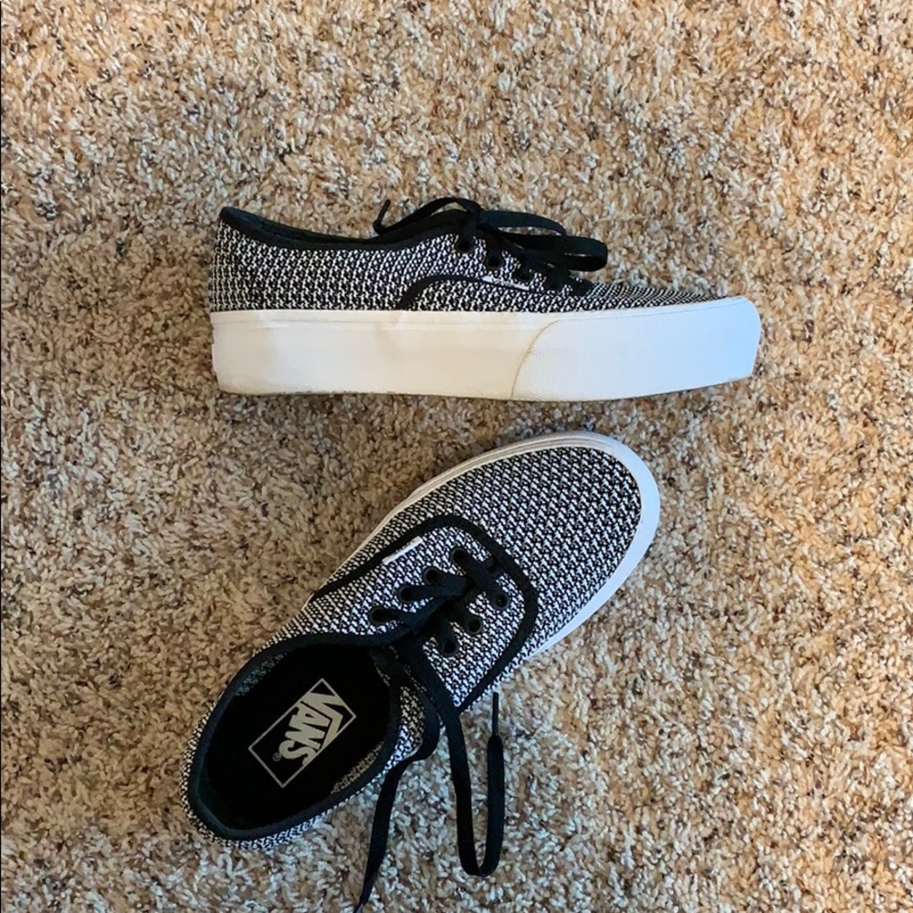 Vans. Black and white. Platform sole. Retro style.